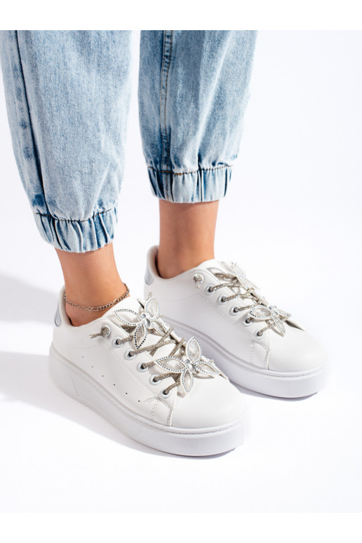 Bílé sportovní boty s motýlky