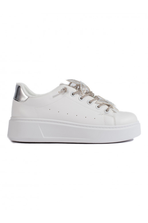 Bílé sportovní boty s motýlky