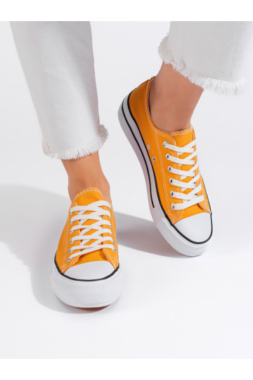 Žluté klasické dámské tenisky na vázaní