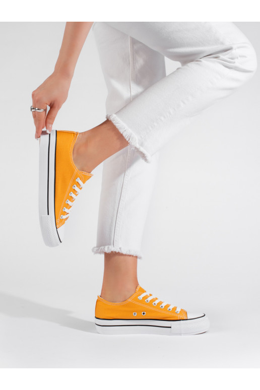 Žluté klasické dámské tenisky na vázaní