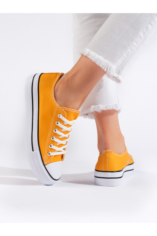 Žluté klasické dámské tenisky na vázaní