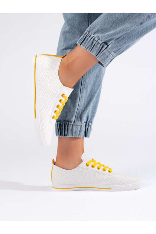 Bílé dámské tenisky s žlutými tkaničkami