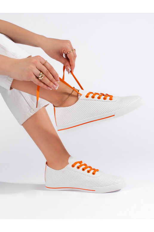 Bílé dámské tenisky s oranžovými tkaničkami
