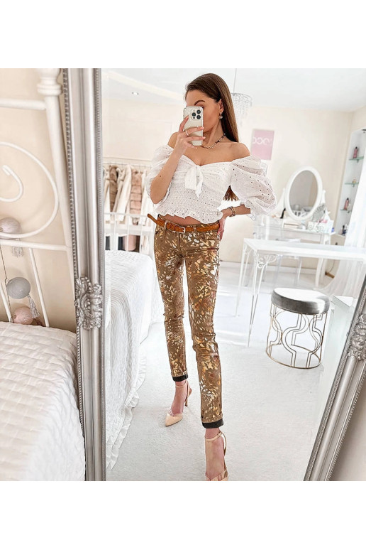 Béžové kalhoty se zlatým leopardím...