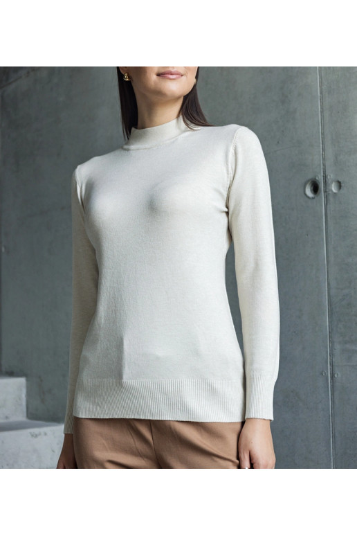 Béžový klasický svetr volného střihu...