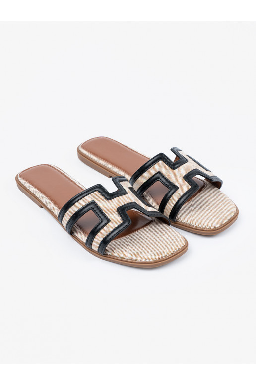 Pantofle z ozdobnymi wycięciami