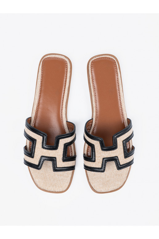 Pantofle z ozdobnymi wycięciami