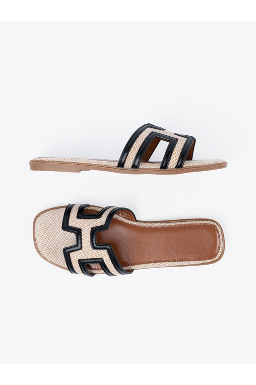 Pantofle z ozdobnymi wycięciami