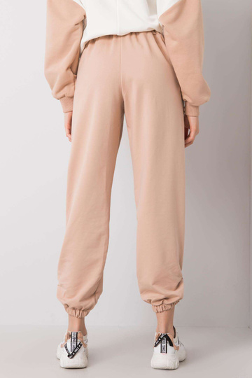 Béžové tepláky Zelena