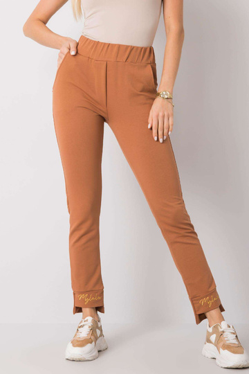 Světle hnědé tepláky s...