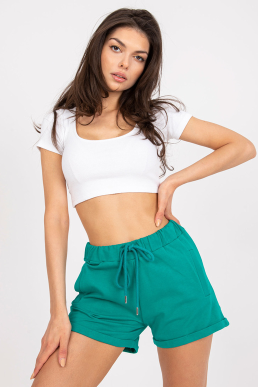 Tmavě zelené basic tepláky s kapsami