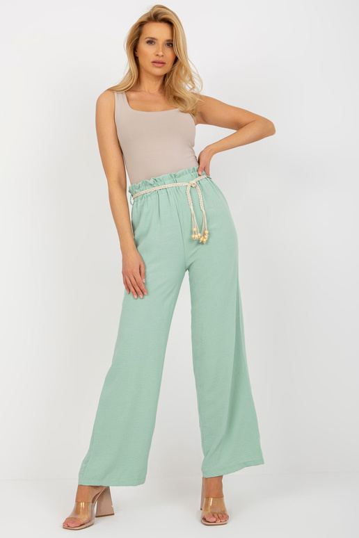 Světle zelené látkové švédské kalhoty...