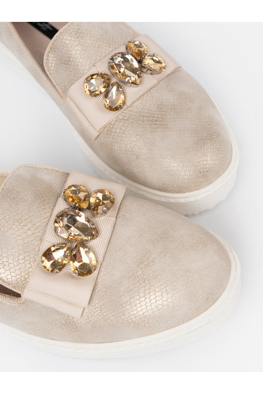 zlaté barvy mokasíny z biżuteryjnym detalem na przodzie
