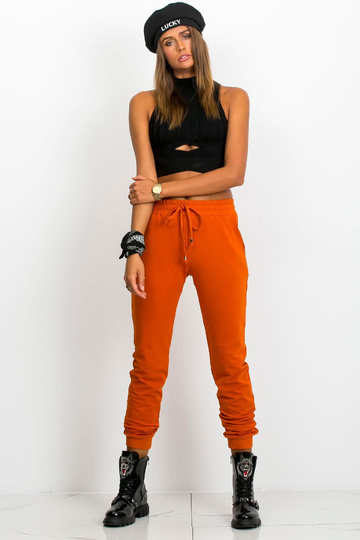 Tmavě oranžové kalhoty Faster