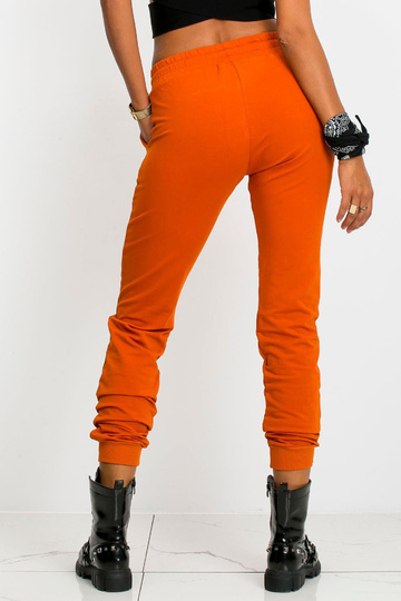 Tmavě oranžové kalhoty Faster 2