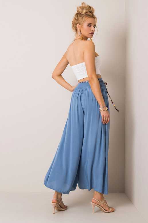 Modré kalhoty Surie