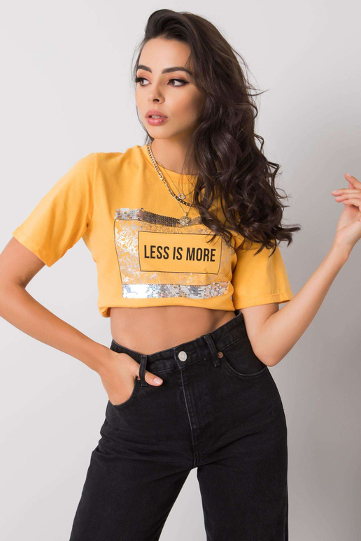 Světle oranžové tričko s nápisem Nikki Světle oranžové tričko s nápisem Nikki