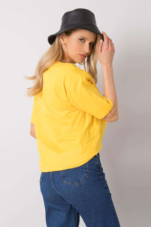 Žluté tričko s potiskem Jasmine RUE... Žluté tričko s potiskem Jasmine RUE...