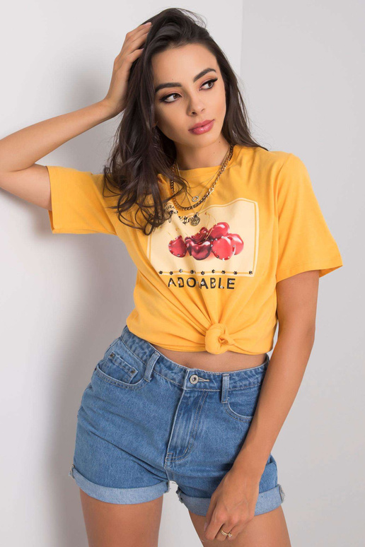 Světle oranžové tričko s nášivkou Ramira Světle oranžové tričko s nášivkou Ramira