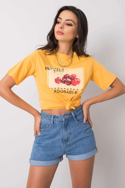 Světle oranžové tričko s nášivkou Ramira Světle oranžové tričko s nášivkou Ramira