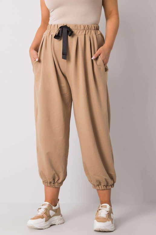 Béžové tepláky velké velikosti s...