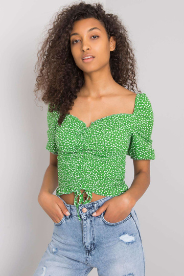 Zelená halenka se vzory...