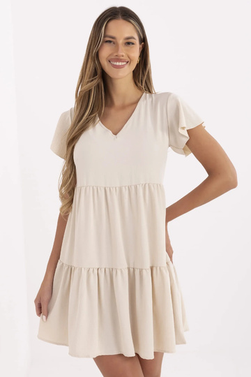 Béžové šaty s volánem...