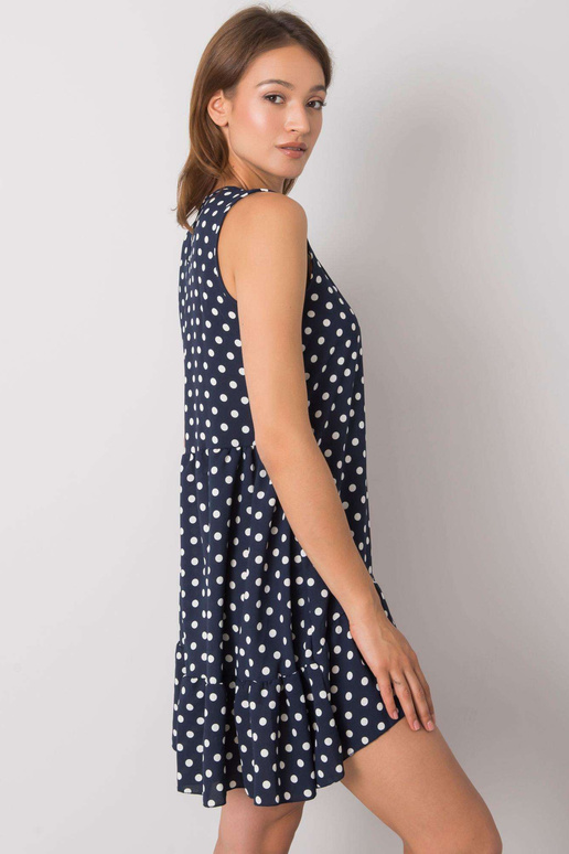 Tmavě modré puntíkované šaty...