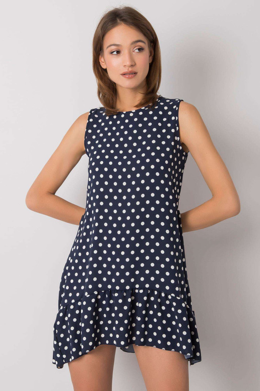 Tmavě modré puntíkované šaty...