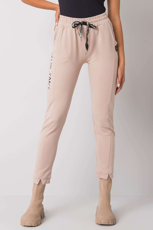 Béžové tepláky s nápisy Peyton