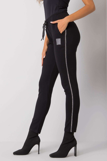 Černé tepláky s pruhy Mannice