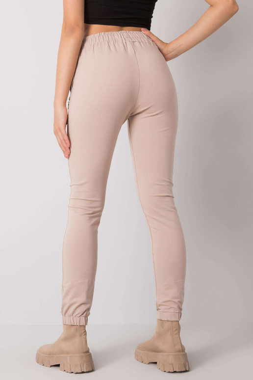 Světle béžové tepláky s kapsami Shadia