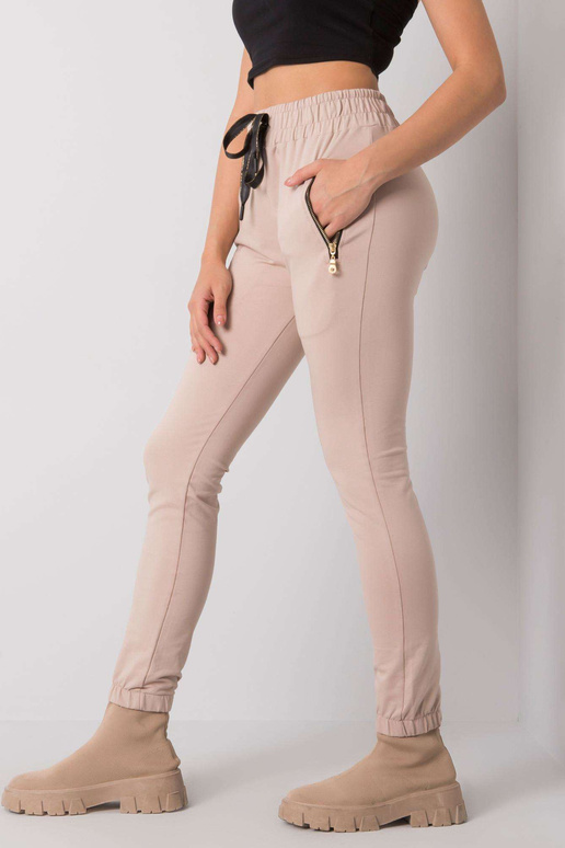 Světle béžové tepláky s kapsami Shadia