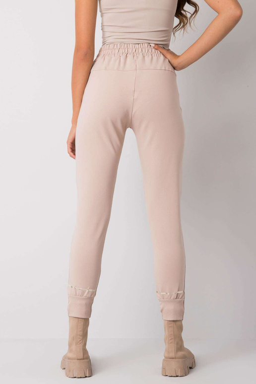 Béžové tepláky s potiskem Larissa