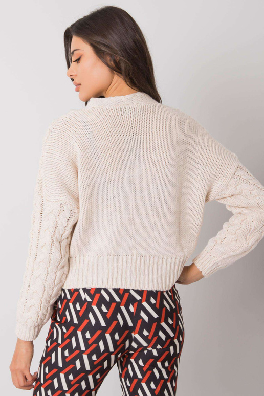 Béžový svetr na knoflíky s copánky...