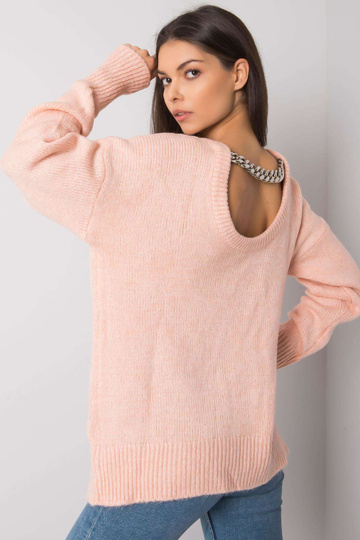 Světle růžový svetr s...