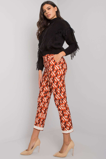 Tmavě oranžové kalhoty se... 2