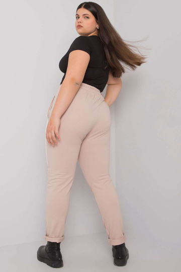 Béžové tepláky plus size s...