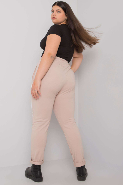 Béžové tepláky plus size s potiskem...