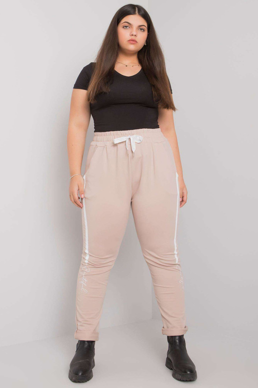 Béžové tepláky plus size s potiskem...