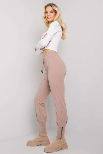 Tmavě béžové tepláky se... 2