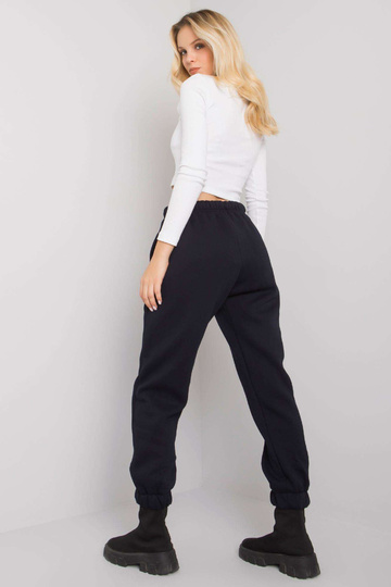 Tmavě modré tepláky s... 2