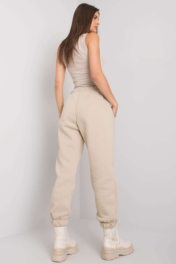 Béžové bavlněné tepláky...