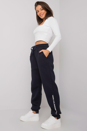 Tmavě modré dámské tepláky...