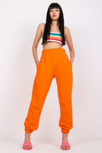 Oranžové tepláky s kapsami... 2