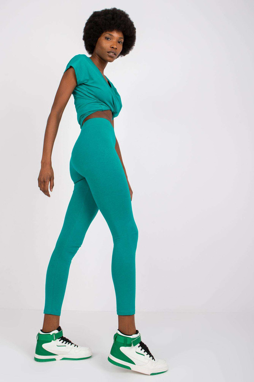 Tmavě zelené dámské ležérní legíny...