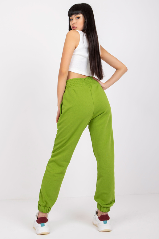 Světle zelené tepláky s kapsami RUE...