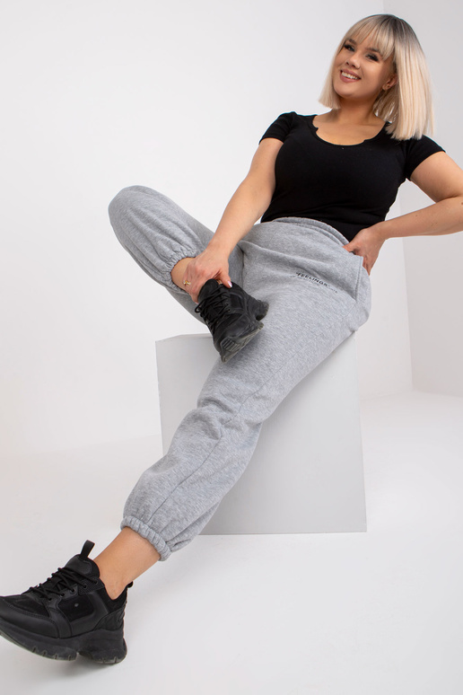 Šedé melanžové tepláky větší...