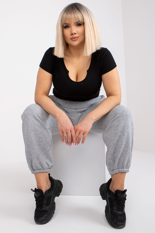 Šedé melanžové tepláky větší...