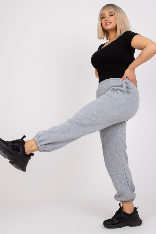 Šedé melanžové tepláky větší...